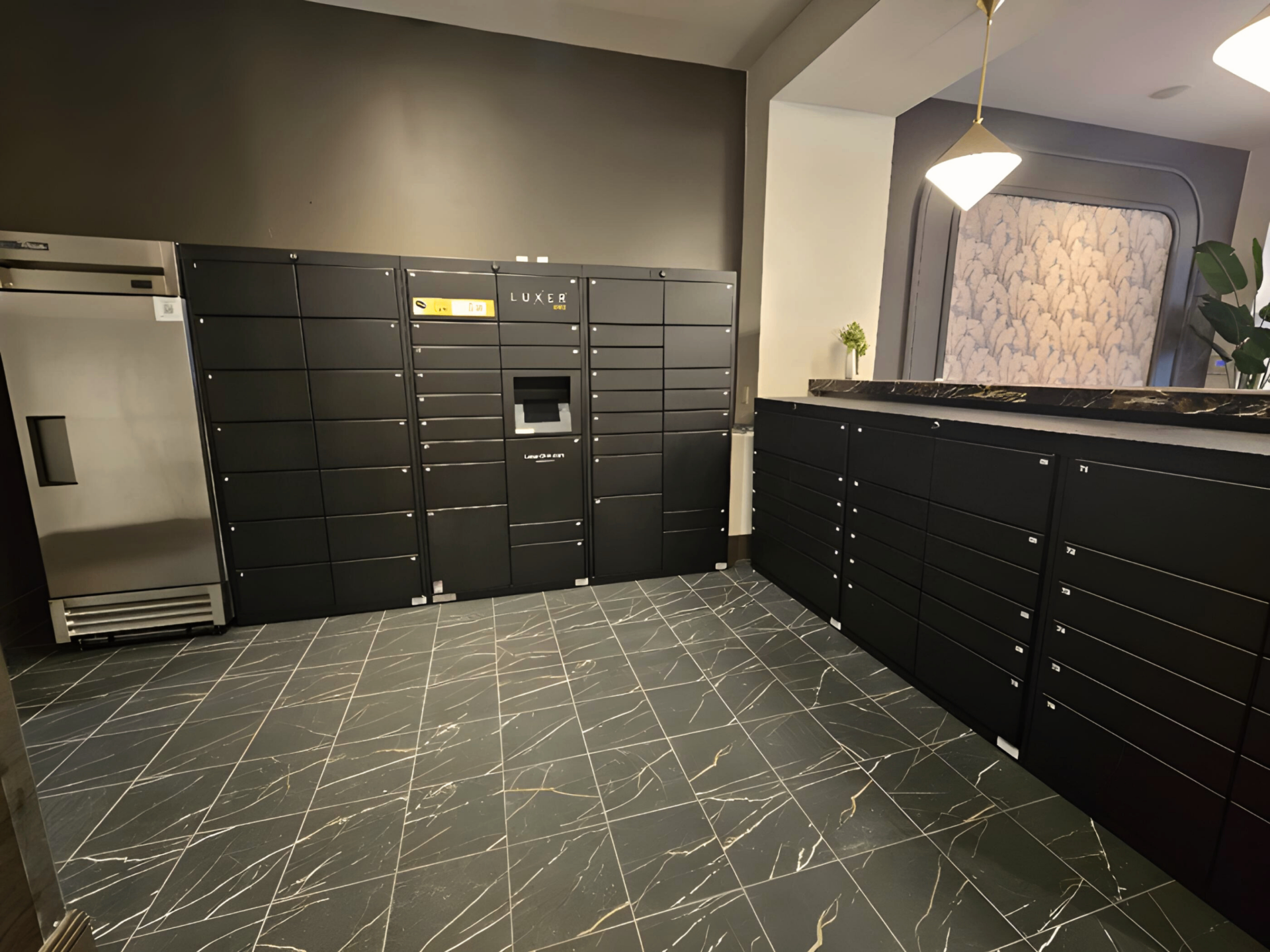 Custom wrapped indoor package lockers with tropical design