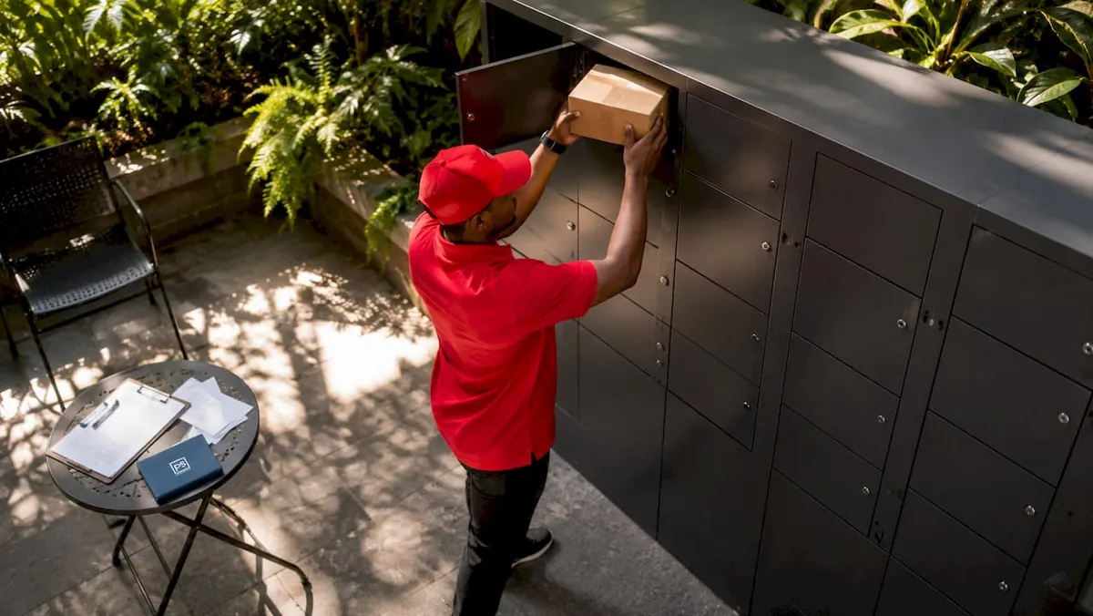 Courier depositing package into apartment locker