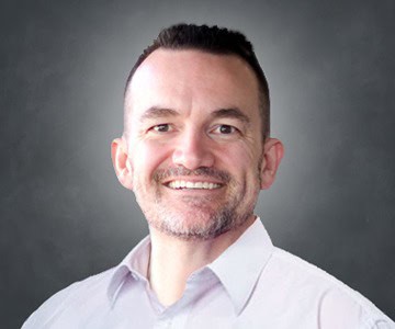 Headshot of Ryan Hamilton, Regional Manager at Postal Solutions Postal Solutions Division
