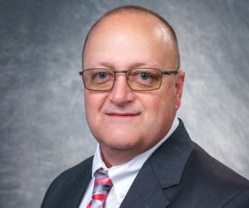 Headshot of Scott A. Pope, Vice President at Postal Solutions Postal Solutions Division